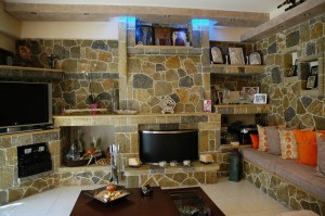 The stone fireplace in the living room